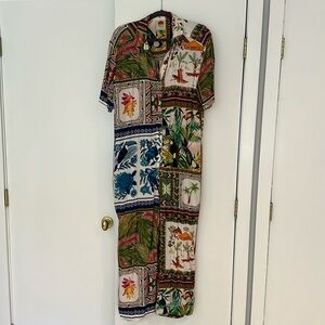 farm Rio!  Loose fitting jumpsuit fits like a medium. Wear belted or unbelted.